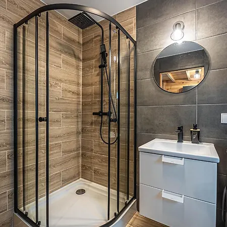 펜션 Mazurskie Wzgorze - Caloroczne 오스트로다